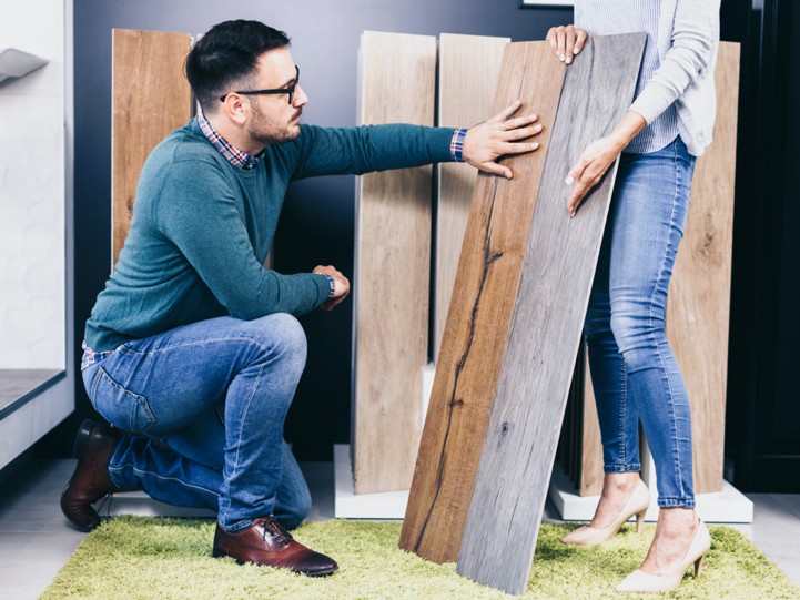 Man showing flooring products | Campbells Carpets Of Nevada Man showing flooring products | Campbells Carpets Of Nevada